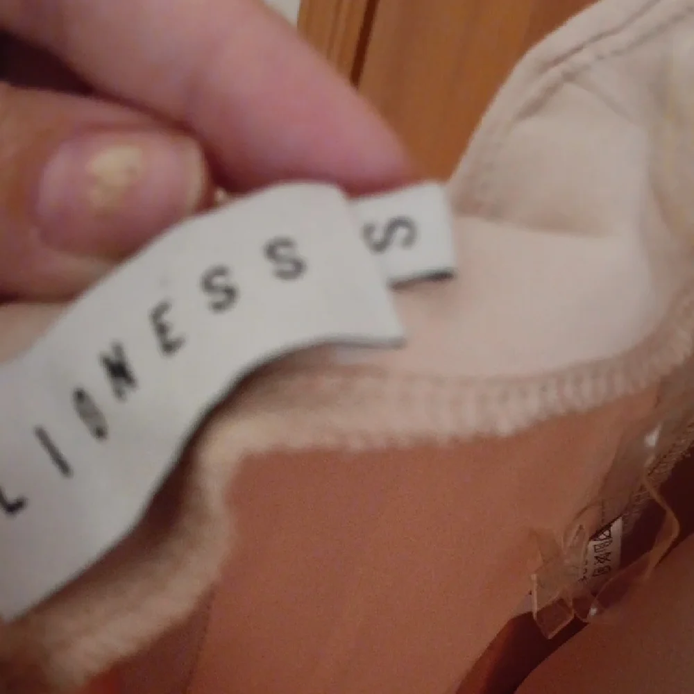 Lioness Chic Tan Jumpsuit with Wide Legs and Sleeveless Design - Picture 2 of 5